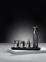 BaByliss Super-X Trimmer-Set mit Haarschneider und mehreren Aufsätzen auf Ladestation
